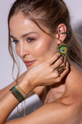 Aretes Pluma Pavo Real — Majestuosidad hecha joya